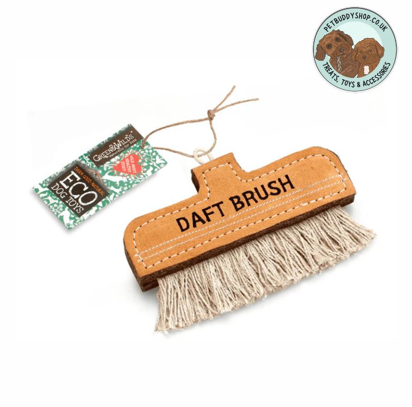 Dog toy made from suede which is a brush labeled 'DAFT BRUSH' with a packaging tag on a white background