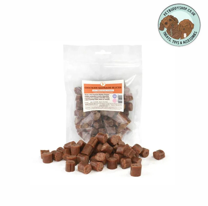Sliced Chicken Sausages dog treats in a transparent packet with sausage slices laying outside the pack on a white background.