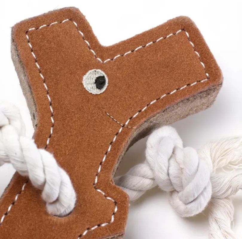 Green & Wilds Stick Man Eco Dog Toy, a large dog toy made with by-products and natural fibres, with rope arms and rope legs, he's great for throwing around and playing tug of war with.